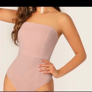 Pink strapless body suite